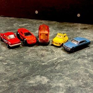 Matchbox Vehicles. Includes Four Cars and One Eco Bus.